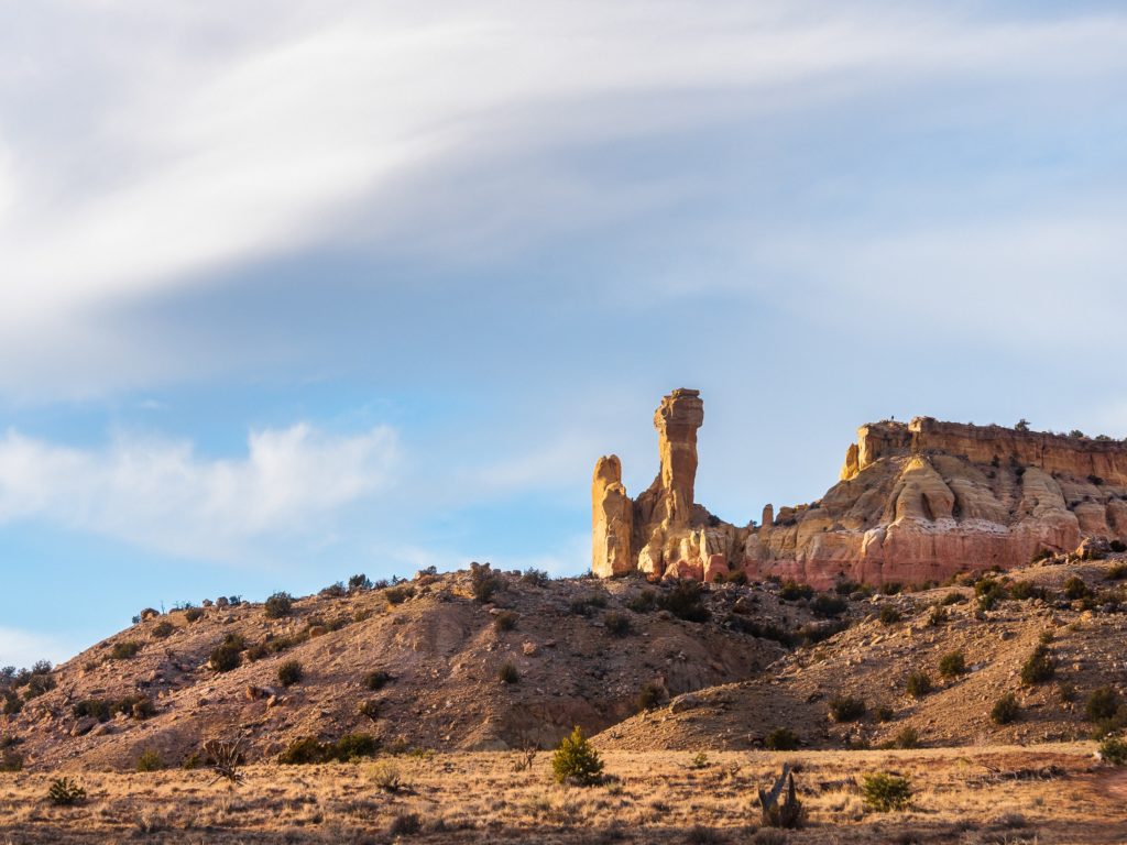 Featured in Oppenheimer Film Locations by Students Fare, this image shows the red rock formations at the Ghost Ranch in New Mexico.